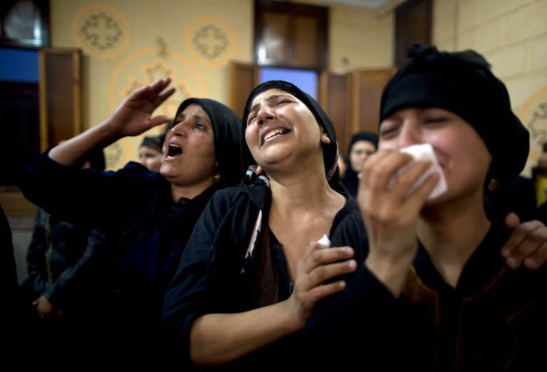 At least 28 people were killed Friday when gunmen opened fire on a bus taking Christians to a monastery near Cairo, according to the Associated Press. (AP Photo/Amr Nabil)