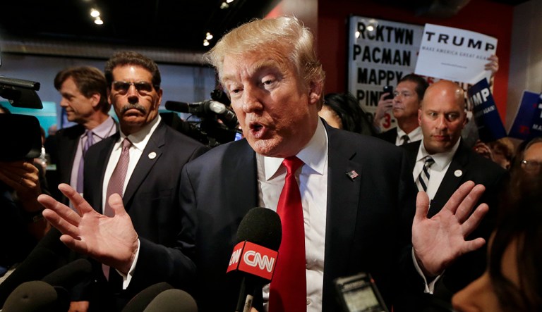 Republican presidential candidate Donald Trump answers questions from reporters after speaking at the National Federation of Republican Assemblies on Saturday, Aug. 29, 2015, in Nashville, Tenn. Trump will decide soon whether to mount a third party bid if he loses the Republican nomination for president, the real estate mogul said Saturday.  "I think over the next couple of weeks you're going to see some things that are very interesting," Trump said after a speech in Nashville to a gathering of tea party activists.
