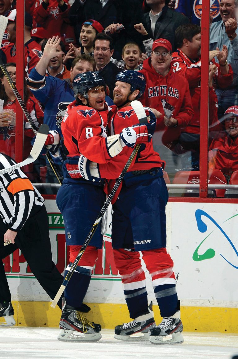Greg Fiume/Getty Images
John Erskine, right, scored less than two minutes in for the Capitals, who scored four times in the first 8:10 on Thursday.