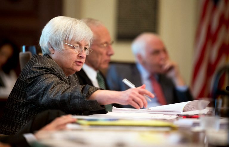 Federal Reserve Chair Janet Yellen, from left, with Vice Chairman Stanley Fischer, and Gov. Daniel Tarullo, and the Board of Governors of the Federal Reserve System presides over a meeting in Washington, Monday, July 20, 2015. (AP Photo/Manuel Balce Ceneta)