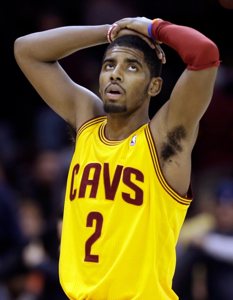   Cleveland Cavaliers' Kyrie Irving reacts late in the fourth quarter of a 90-86 loss to the Milwaukee Bucks in an NBA basketball game on Friday, Dec. 14, 2012, in Cleveland. (AP Photo/Mark Duncan)  