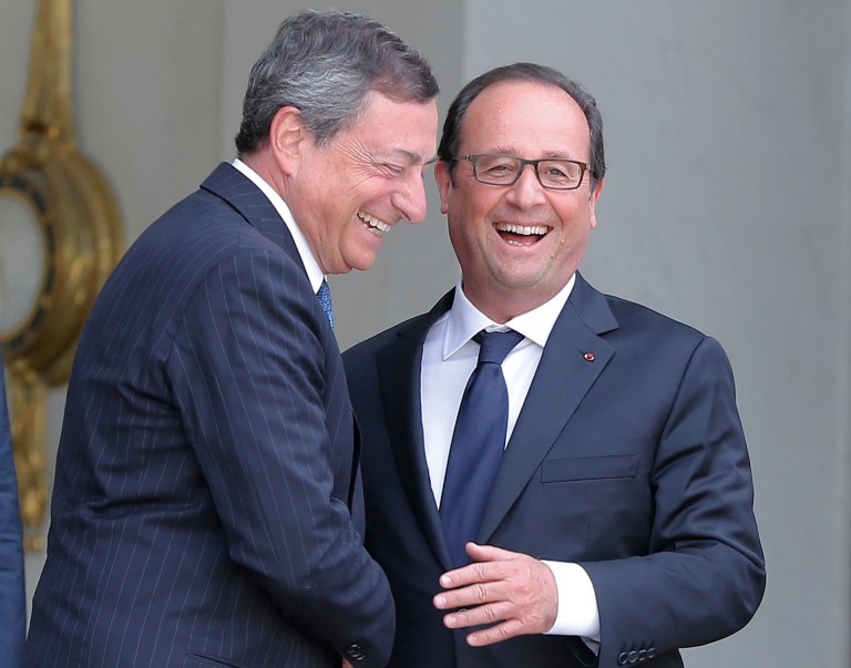 French President Francois Hollande, right, shakes hand with President of the European Central Bank, Mario Draghi, after a meeting at the Elysee Palace, in Paris, Monday, Sept. 1, 2014. Bank chief Mario Draghi called in a speech last month for fiscal policies to support growth, a departure from the ECB's implicit support for austerity. No immediate steps were expected but the bank has begun work on a program to buy asset-backed securities. (AP Photo/Jacques Brinon)