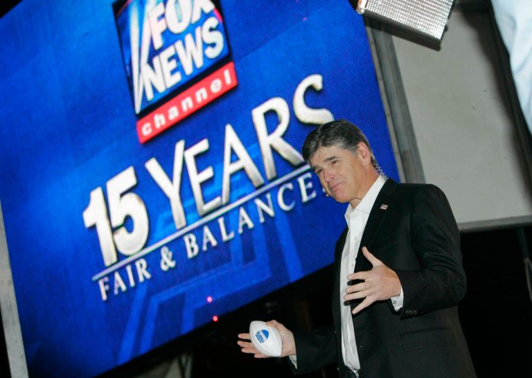 Sean Hannity talks with audience during taping of Fox News'15th anniversary special. 