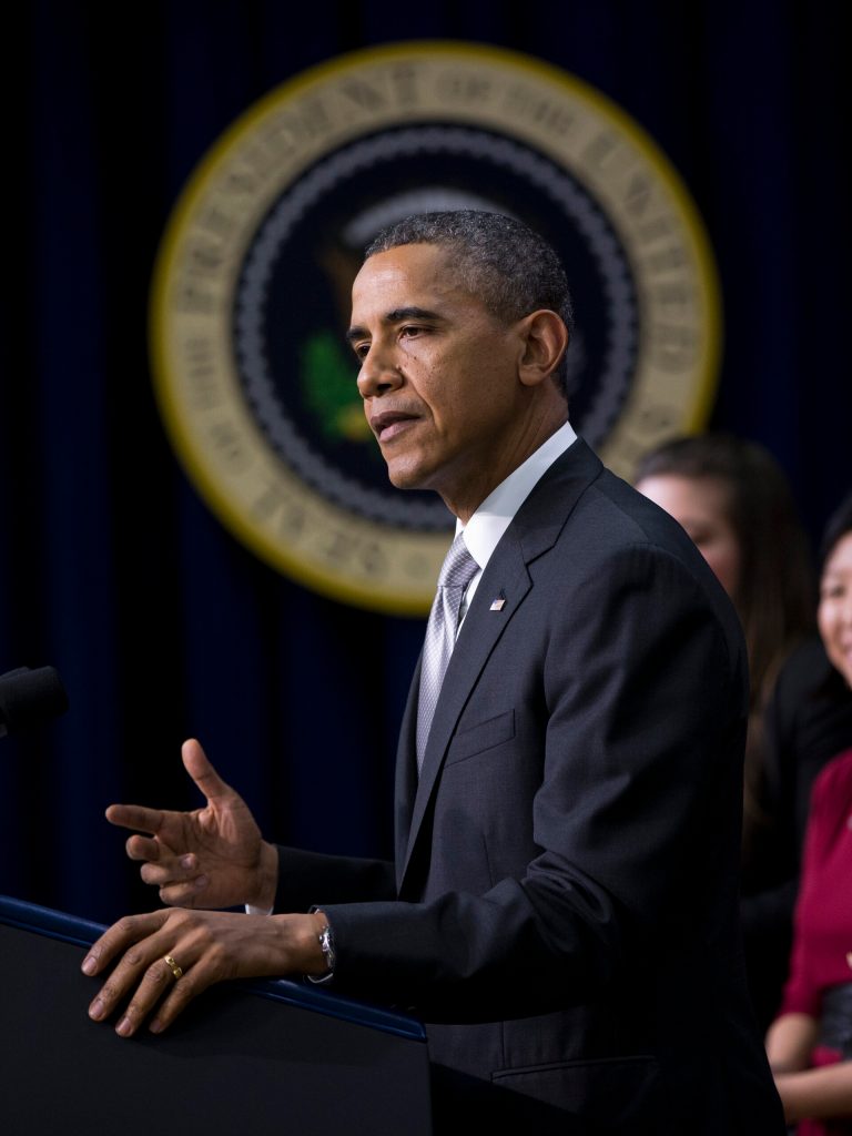 President Barack Obama gestures as he speaks about the new health care law, Tuesday, Dec. 3, 2013, in the South Court Auditorium in the Eisenhower Executive Office Building on the White House complex in Washington. The president said his signature health care law 