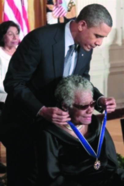President Barack Obama presents a Medal of Freedom to author and poet Maya Angelou during a ceremony in the East Room of the White House in Washington, Tuesday, Feb. 15, 2011. [AP Photo