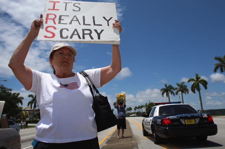 The IRS can crack down on you -- and try to keep your money -- if your deposits are of an amount it deems suspicious. (Photo by Joe Raedle/Getty Images)