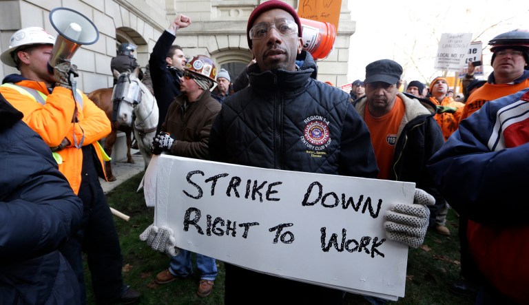The workers reported nearly equal levels of satisfaction regarding wages, workplace safety, and healthcare benefits. (AP Photo/Paul Sancya)