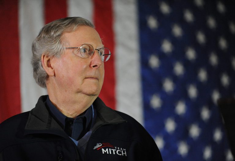 In Kentucky, the tea party-backed challenger to Sen. Mitch McConnell is trying to explain old investor letters that recently surfaced, undermining his criticisms of government bailouts of banks. (AP Photo/Stephen Lance Dennee, File)