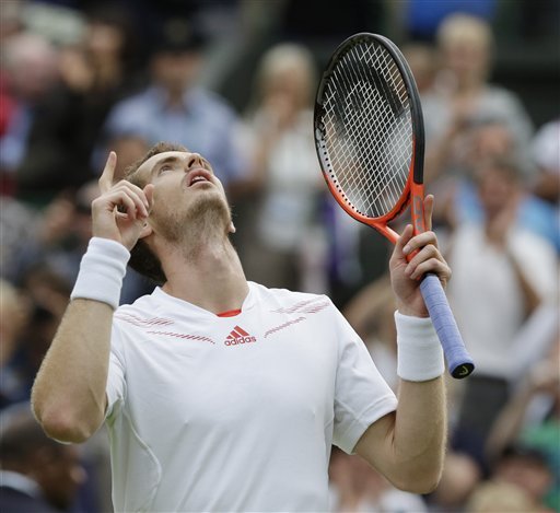 Andy Murray of Britain reacts after defeating David Ferrer of Spain during a quarterfinals match at the All England Lawn Tennis Championships at Wimbledon, England, Wednesday July 4, 2012. (AP Photo/Anja Niedringhaus)
