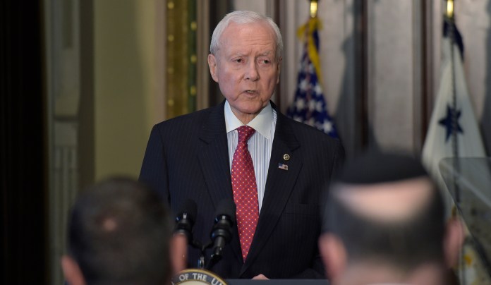"We're way ahead on it, but we still have to work through it. I know where we're going with it," said Sen. Orrin Hatch. (AP Photo/Susan Walsh)