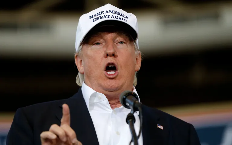 New president used his old Twitter account to reiterate the populist message in his inaugural address. (AP Photo/Gerald Herbert, File)