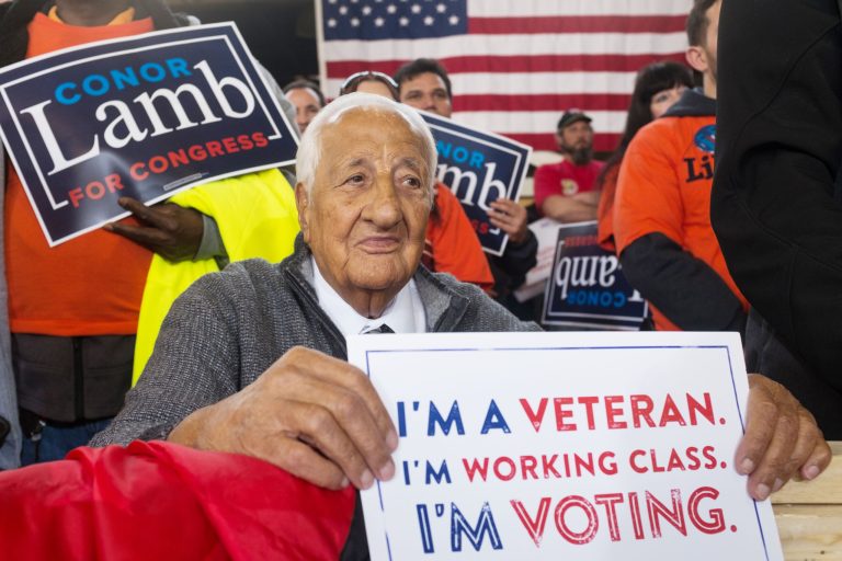 Johnny Bento, a longtime supporter of unions in Pittsburgh, listens to former Vice President Joe Biden speak at a rally for Conor Lamb, Democratic candidate for Pennsylvania's 18th Congressional District, at the Carpenters Training Center on March 6 in Collier Township, Pa.