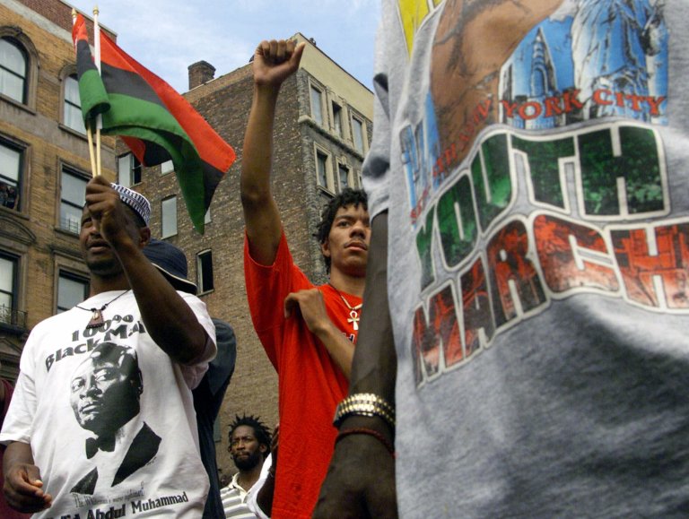 Participants in the second Million Youth March for minority youths listen to speeches Saturday, Sept. 4, 1999, at the rally in the Harlem neighborhood of New York. Some 20 years later, minorities 18 and younger are to outnumber whites. (AP Photo/Suzanne Plunkett)