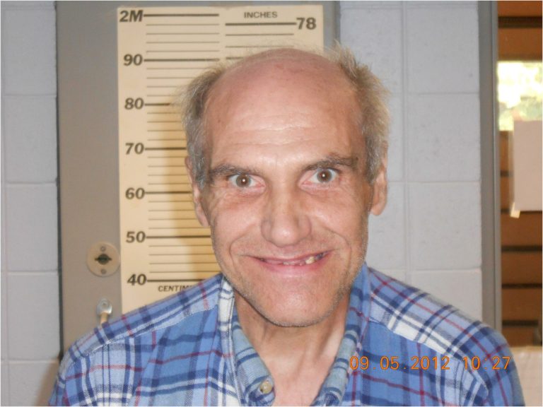 This Sept. 5, 2012 photo released by Portage County Jail shows Charles Jost, 67, of Amherst, Wis. Jost, one of three Wisconsin residents accused of cashing the Social Security checks of a relative who's presumed dead ,was found not guilty this week by reason of mental defect, after a medical expert testified that the man may have failed to understand he was breaking the law. (AP/Portage County Jail)