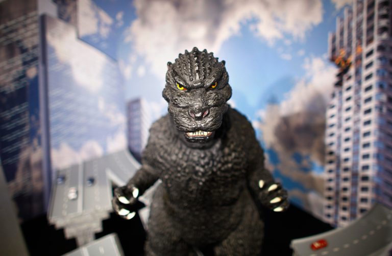 FILE - In this April 28, 2014 file photo, a large size figure of Godzilla in a diorama is on display at Cheepa's gallery in Tokyo. At a humble Tokyo laboratory, Godzilla, including the 1954 black-and-white original, is stomping back with a digital makeover that delivers four times the image quality of high definition. Experts say the chemical reactions used to make old movies stored far greater detail than was visible with the limited projection technology of the era, as well as with subsequent digital updates. (AP Photo/Junji Kurokawa, File)