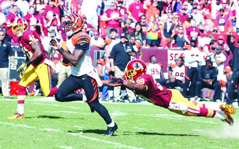 Jennifer Milbrett/The Washington Examiner
Andrew Hawkins ran away from the Redskins' Richard Crawford for a 59-yard touchdown that proved to be the winning score.