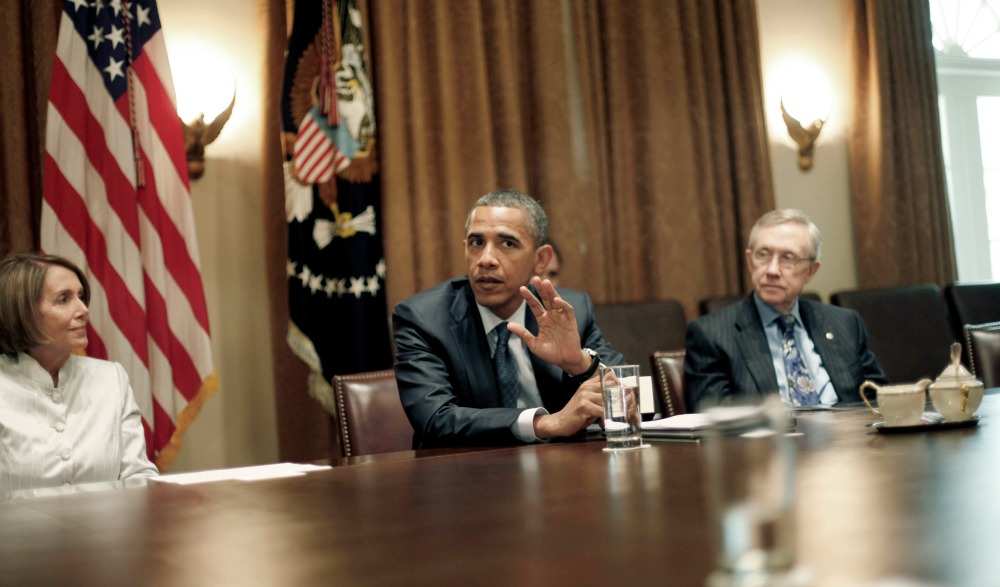 Obama huddles with Dems ahead of retreat