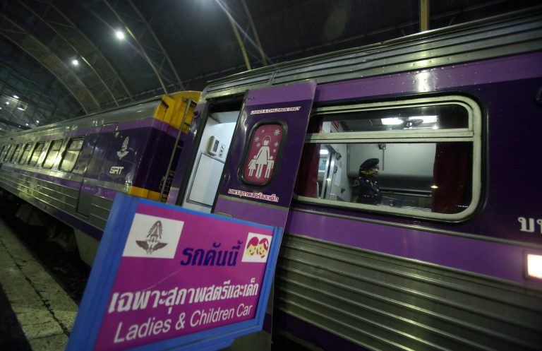 In this picture taken Monday, Sept. 29 , 2014. A female railway  police officer inspect the lady-child  train carriages at Hua Lamphong train station in Bangkok, Thailand, The State Railway of Thailand introduced a womenâs-only carriage on main routes for overnight trains following the rape and murder of a 13-year-old girl on an overnight train.(AP Photo/Sakchai Lalit)