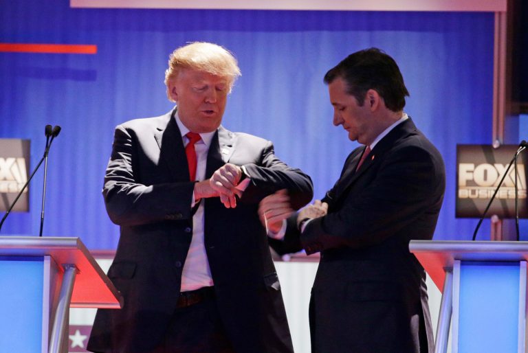 Republican presidential candidate, businessman Donald Trump speaks to Republican presidential candidate, Sen. Ted Cruz, R-Texas, at a break during the Fox Business Network Republican presidential debate at the North Charleston Coliseum, Thursday, Jan. 14, 2016, in North Charleston, S.C. (AP Photo/Chuck Burton)