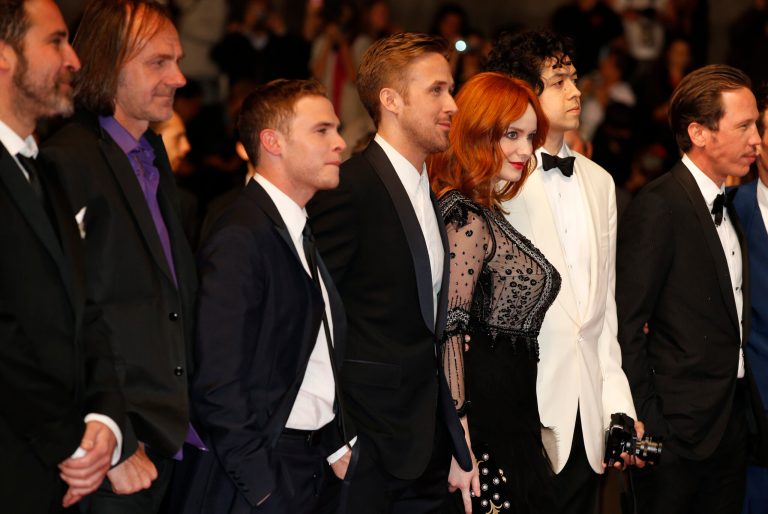 From third left, actor Iain De Caestecker, director Ryan Gosling, actress Christina Hendricks and Geoffrey Arend arrive for the screening of Two Days, One Night (Deux jours, une nuit) at the 67th international film festival, Cannes, southern France, Tuesday, May 20, 2014. (AP Photo/Alastair Grant)