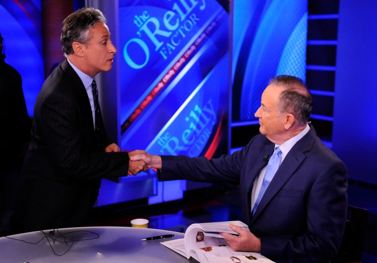 FILE - In this Sept. 22, 2010 file photo, Comedy Central's Jon Stewart, left, and Bill O'Reilly tape an interview in New York. Stewart and  O'Reilly, a celebrity odd couple with a history of public political feuds, tangle in a sold-out debate in Washington. The so-called 