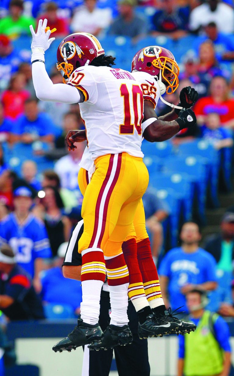 Bill Wippert/AP
Washington Redskins rookie quarterback Robert Griffin III threw a touchdown pass to Pierre Garcon in the first quarter Thursday.