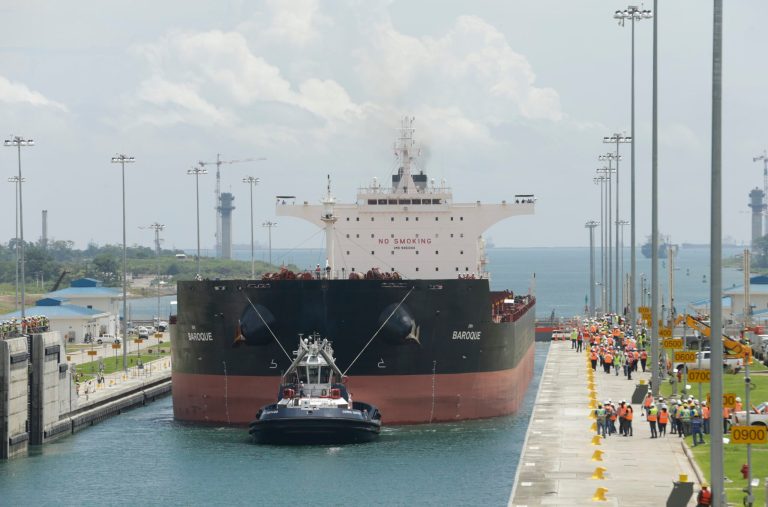 The Malta-flagged cargo ship named Baroque, a post-Panamax vessel, navigates the Agua Clara locks during the first test of the newly expanded Panama Canal in Agua Clara, Panama, on June 9. (AP Photo)