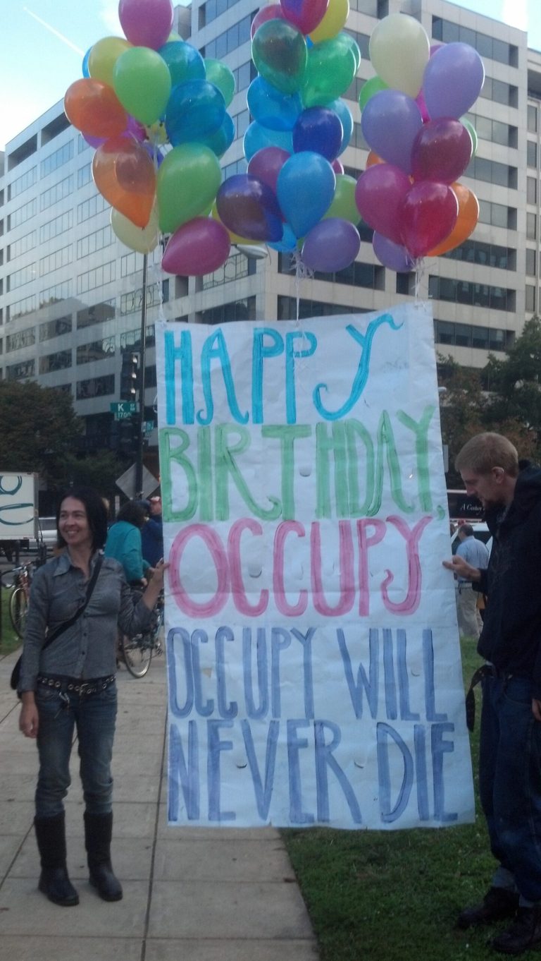 Occupy D.C. protesters on the movement's one-year anniversary in downtown D.C. on the morning of Oct. 1. (Naomi Jagoda/Examiner)