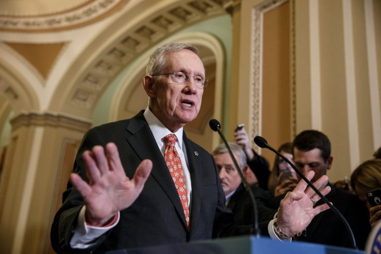 Senate Majority Leader Harry Reid, D-Nev., speaks with reporters following a closed-door policy meeting at the Capitol in Washington, Tuesday, Dec. 2, 2014. (AP Photo/J. Scott Applewhite)