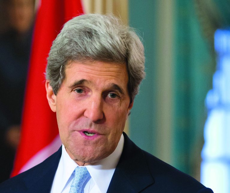 FILE - In this Feb. 8, 2013 file photo, Secretary of State John Kerry speaks to reporters at the State Department in Washington. Kerry said Wednesday, the world must show its resolve in the face of North Korea's nuclear provocations or risk emboldening Iran, which is under scrutiny over its uranium enrichment program. (AP Photo/J. Scott Applewhite, File)