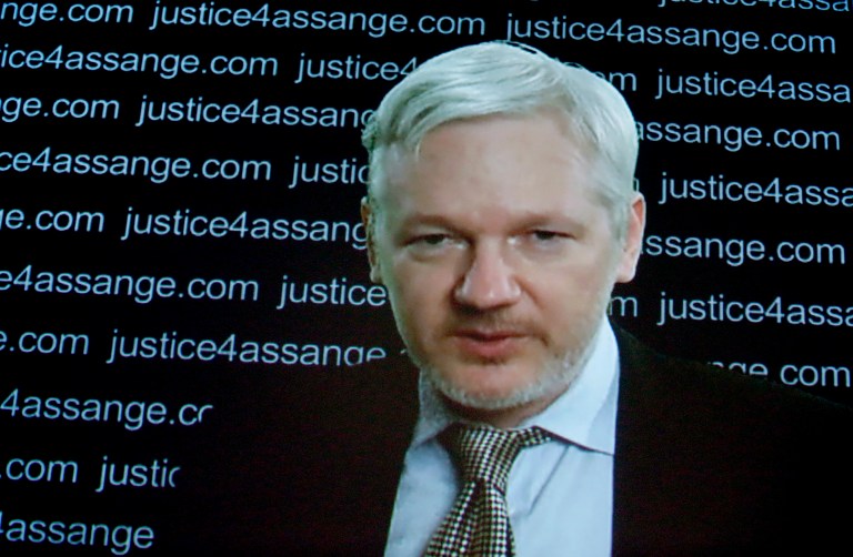 Hillary Clinton on Tuesday denied reports that she once suggested taking out WikiLeaks founder Julian Assange with a drone strike. (AP Photo/Frank Augstein)