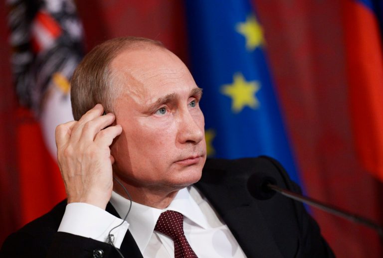 Russian President Vladimir Putin attends a news conference after his meeting with Austrian President Heinz Fischer in the Hofburg Palace in Vienna, Austria, Tuesday, June 24, 2014. The Russian President visited Vienna on Tuesday, where he met with the Austrian leadership and officials from the Organization for Security and Co-operation who had helped broker peace talks between Kiev and Moscow. (AP Photo/RIA-Novosti, Alexei Nikolsky, Presidential Press Service)