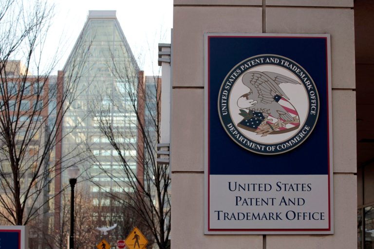 FILE - This Feb. 25, 2011 file photo shows Tthe U.S. Patent and Trademark Office in Alexandria, Va. The Supreme Court on Thursday tossed out an Australian company's patent for business software in a decision that clarifies standards for awarding patents, but not as much as some firms had hoped. In a case closely watched by the industry, justices ruled unanimously that the government should not have issued a patent to Alice Corp. in the 1990s because the company simply took an abstract idea that has been around for years and programmed it to run through a computer.  (AP Photo/Alex Brandon)
