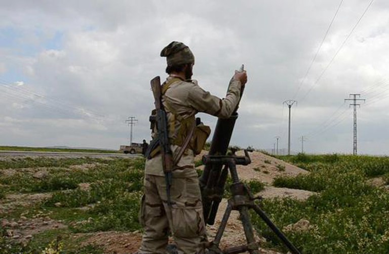 The UK-based Syrian Observatory for Human Rights said military helicopters dropped the barrel bombs on the rebel-held Shaar neighborhood of the city of Aleppo and on a market in the town of al-Bab, which is held by Islamic State militants. (AP Photo)