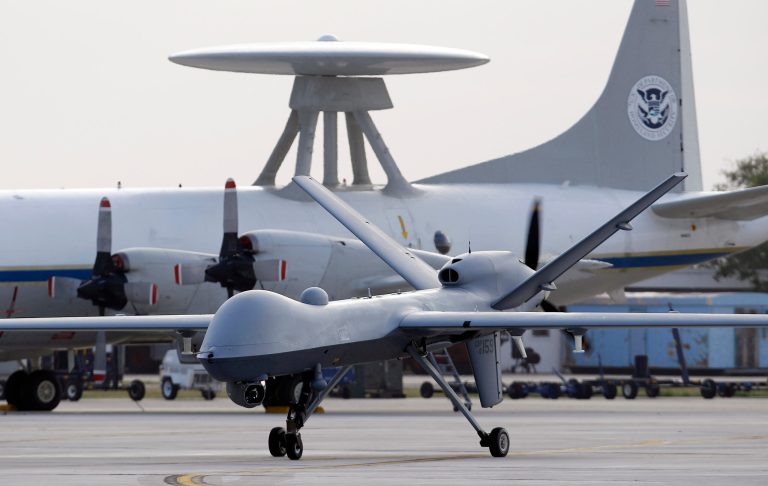 FILE - In this Nov. 8, 2011 file photo, a Predator B unmanned aircraft taxis at the Naval Air Station in Corpus Christi, Texas. A U.S. military drone strike in Yemen in December 2013 may have killed up to a dozen civilians on their way to a wedding and injured others, including the bride, a human rights group says. U.S. officials say only members of al-Qaida were killed, but they have refused make public the details of two U.S. investigations into the incident.(AP Photo/Eric Gay, File)