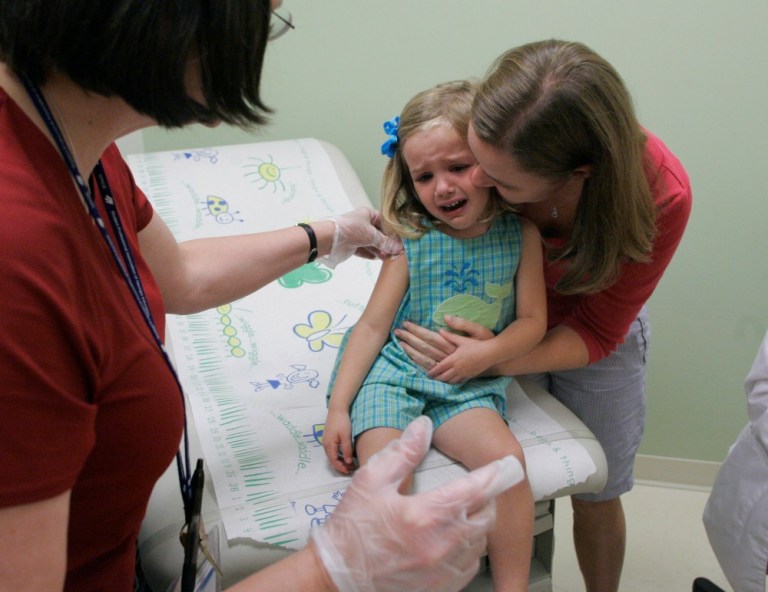 A report released Thursday by the Robert Wood Johnson Foundation found that 1 million children gained coverage during the first full year of the insurance marketplaces set up under President Obama's healthcare law. (AP Photo)