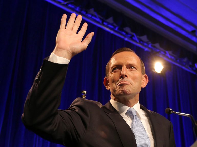 Newly elected Prime Minister Tony Abbott arrives on stage to deliver his victory speech on September 7, 2013 in Sydney, Australia. (Rob Griffith/Getty Images)