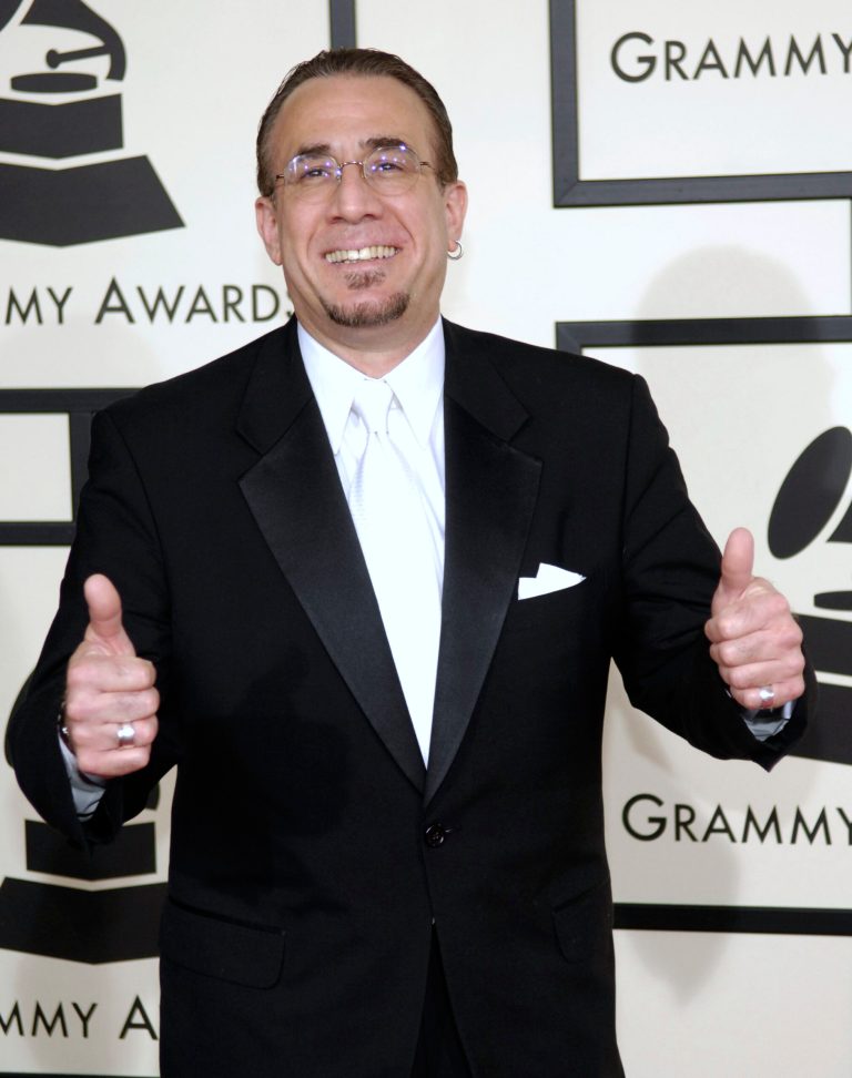   FILE - In this Feb. 10, 2008 file photo, Latin jazz musician Bobby Sanabria arrives at the 50th Annual Grammy Awards in Los Angeles. Sanabria, who led the protest against the Recording Academy when it downsized from 109 to 78 categories last year, is nominated for best Latin jazz album _ one of the awards that had been eliminated, but returns at the awards show in 2013. (AP Photo/Chris Pizzello, File)  