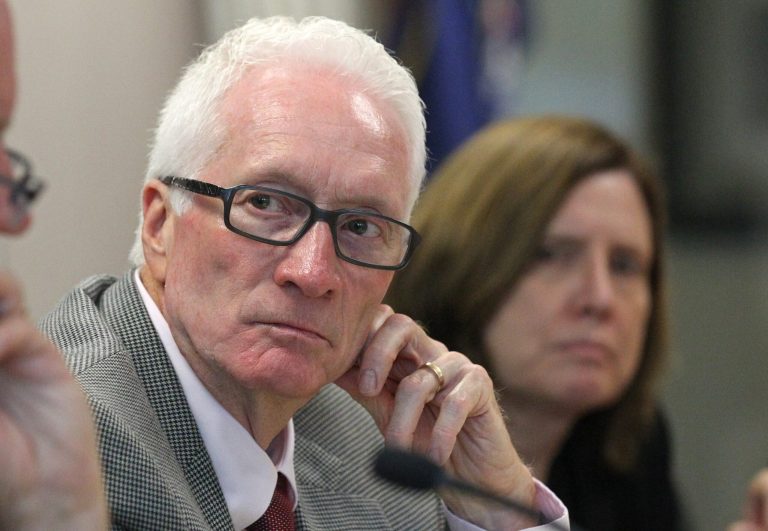 David Gladwell, chairman of the state liquor commission, looks on during the monthly meeting of the state liquor commission Tuesday, July 29, 2014, in Salt Lake City. The open market for Utah liquor licenses has been quiet since bars were allowed to start selling them directly to would-be business owners this month, the state liquor commission said Tuesday. The slow start doesn't come as a surprise to Gladwell, who thinks most of the 10-12 businesses on the wait list for new licenses through the state will sit tight. (AP Photo/Rick Bowmer)