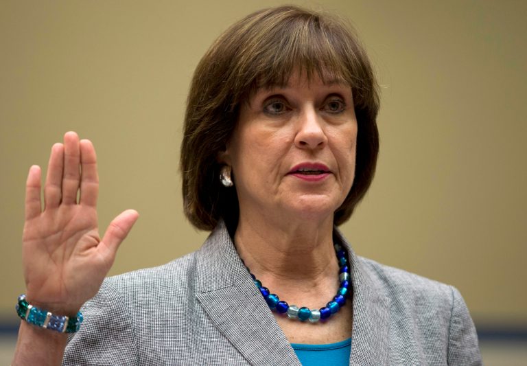 FILE - In this May 22, 2013, file photo, then-IRS official Lois Lerner is sworn in on Capitol Hill in Washington, before the House Oversight Committee hearing to investigate the extra scrutiny IRS gave to tea party and other conservative groups that applied for tax-exempt status.  The House is preparing to vote May 7, on holding Lerner  in contempt of Congress for refusing to testify at a pair of committee hearings about her role in the agency's tea party controversy. (AP Photo/Carolyn Kaster, File)