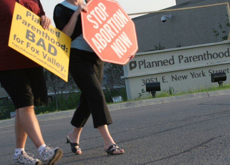 In the past few years, states have passed record numbers of abortion restrictions. (AP Photo/Stacie Freudenberg)