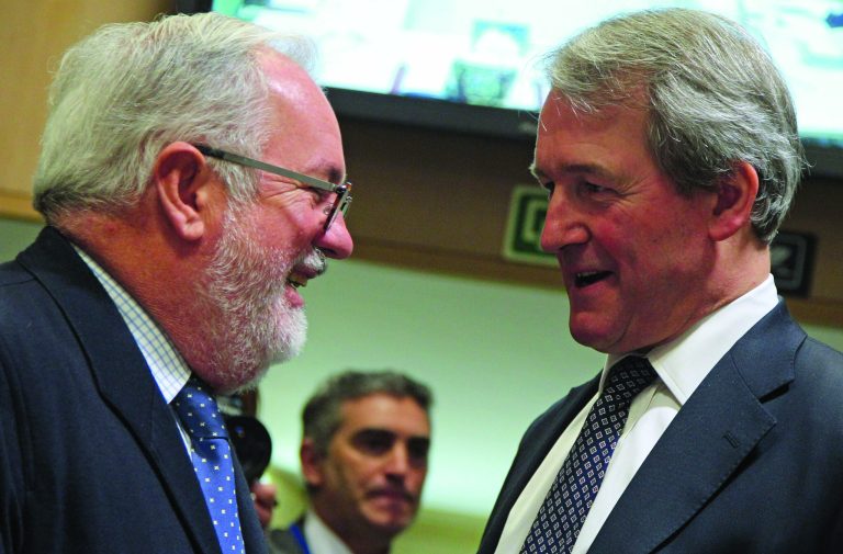 Spain's agriculture minister Miguel Arias Canete, left, talks with British Secretary of State for the Environment, Food, & Rural Affairs Owen William Paterson, during the EU agriculture ministers council at the European Council building in Brussels, Monday, Feb. 25, 2013. The European Union's agriculture ministers gathered in Brussels Monday to discuss the widening scandal's fallout, with some member states pressing for tougher rules to regain consumer confidence. (AP Photo/Yves Logghe)