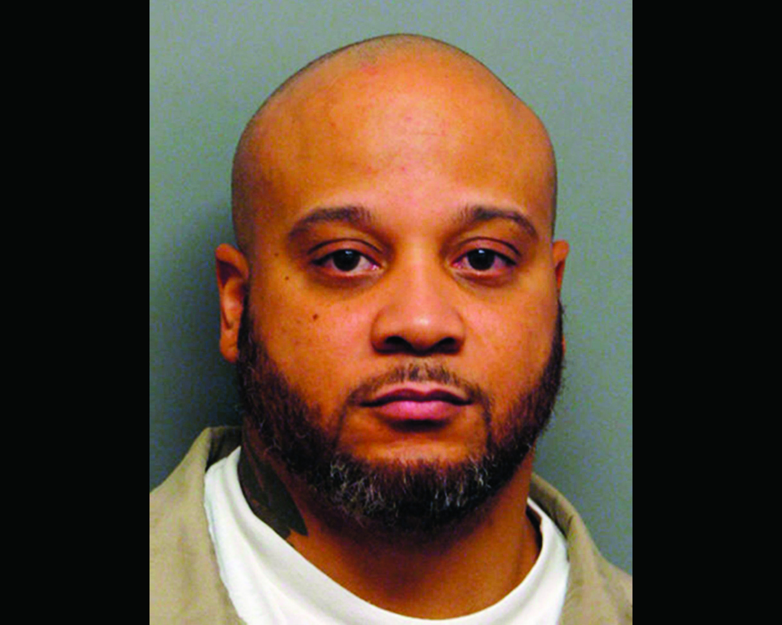 Mistakenly freed killer captured while watching TV