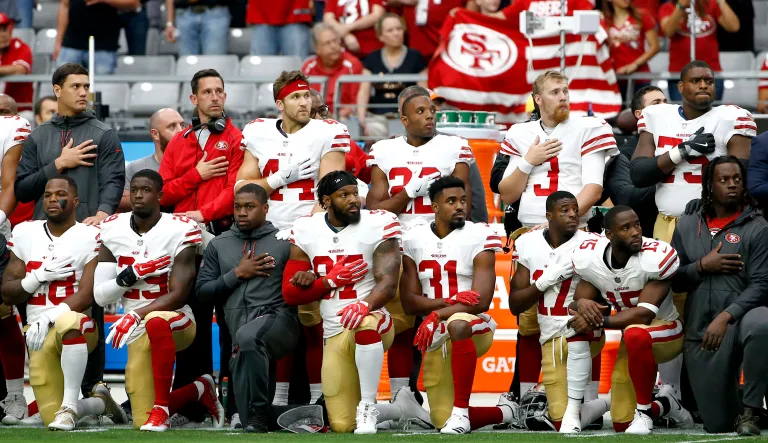 A change in the league's rules could mean that players who kneel or sit during the anthem may be open to punishment. (AP Photo/Ross D. Franklin)