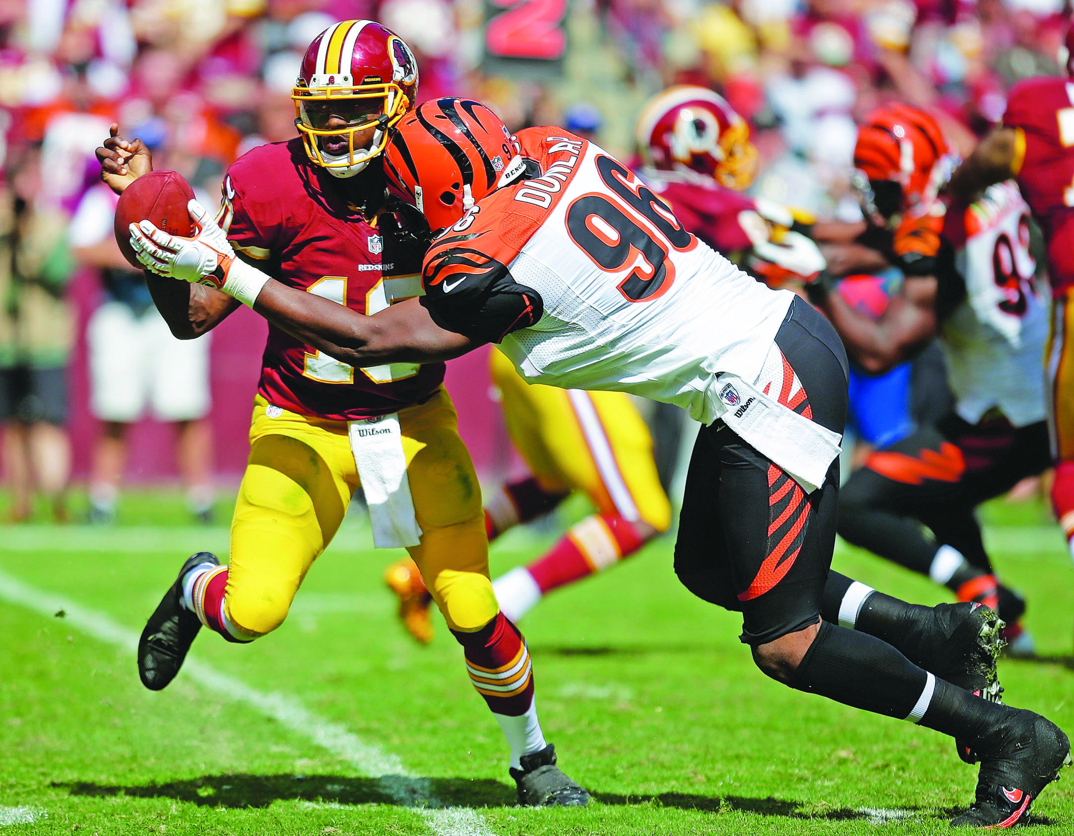 Redskins worry RG3 is taking too many hits