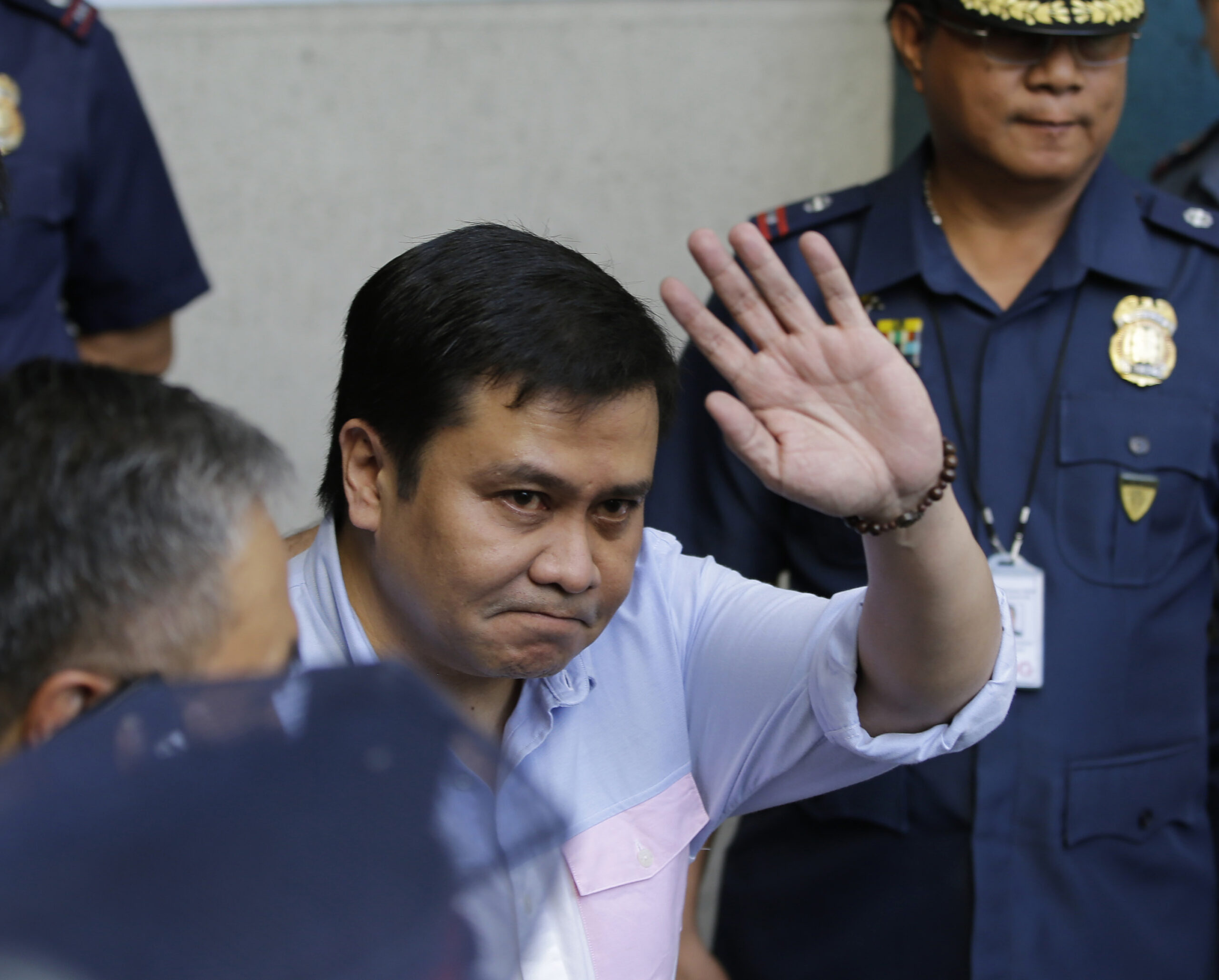 Philippine senator charged with plunder surrenders