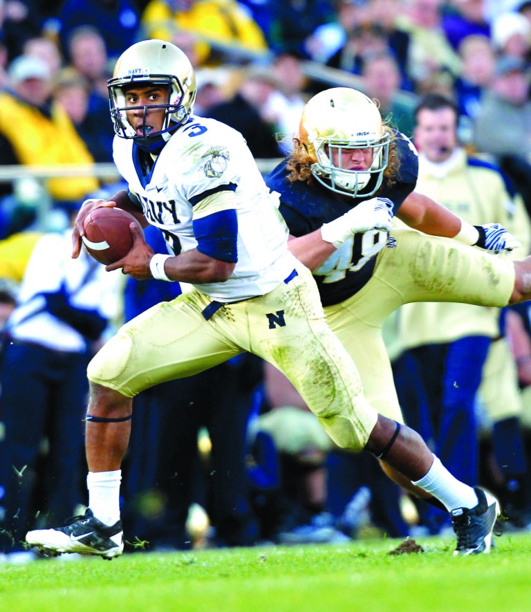 Michael Conroy/AP
Last year vs. Notre Dame, Navy quarterback Trey Miller went 5-for-13 for 33 yards and a touchdown and ran 19 times for 55 yards.