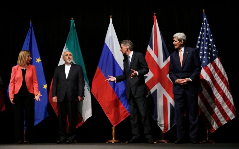 British Foreign Secretary Philip Hammond, 2nd right, U.S. Secretary of State John Kerry, right, and European Union High Representative for Foreign Affairs and Security Policy Federica Mogherini, left, talk to Iranian Foreign Minister Mohammad Javad Zarif. (Carlos Barria, Pool Photo via AP)