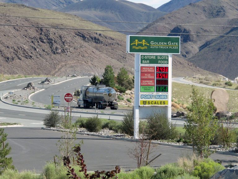 A tanker passes the Golden Gate Auto Truck Plaza at the Tahoe Reno Industrial Center bound for U.S. Interstate 80, Thursday, Sept. 4, 2014, 15 miles east of Sparks, Nev., near the access road to the site where Tesla Motors Inc. plans to build a 6,500 worker 