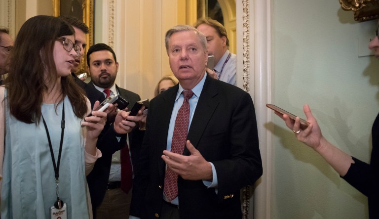 Sens. Graham and Corker criticize rumored national security changes. (AP Photo/J. Scott Applewhite)